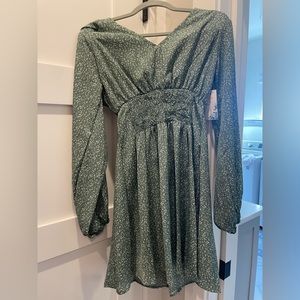 Whimsy Apparel Clothing green dress. V-neck with smocked waist